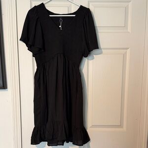 Elegant Black Dress with Ruffle Hem